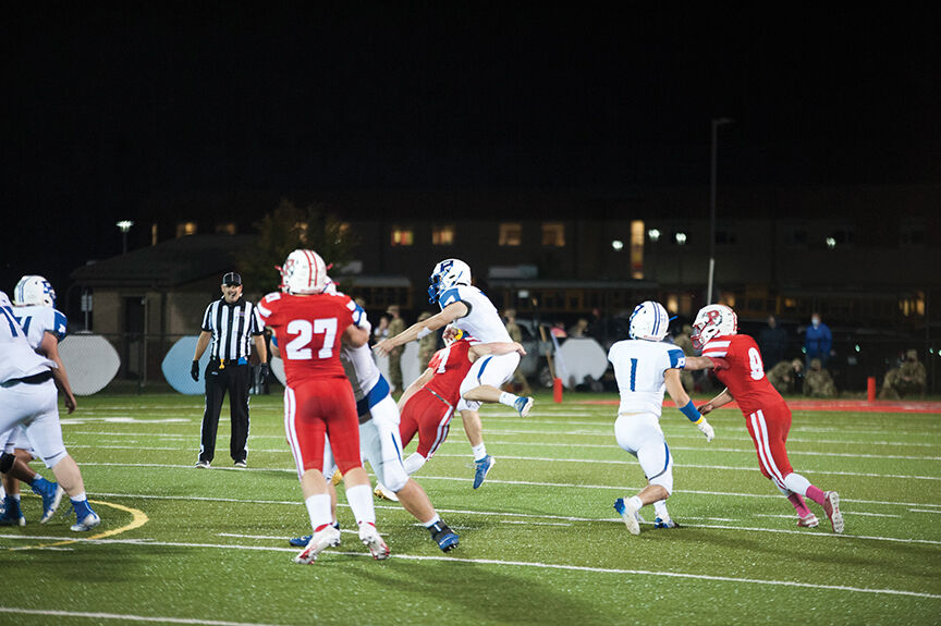 10-8 perry Jayvine Crowley Hits Paintsville quarterback Jake Hyden.jpg